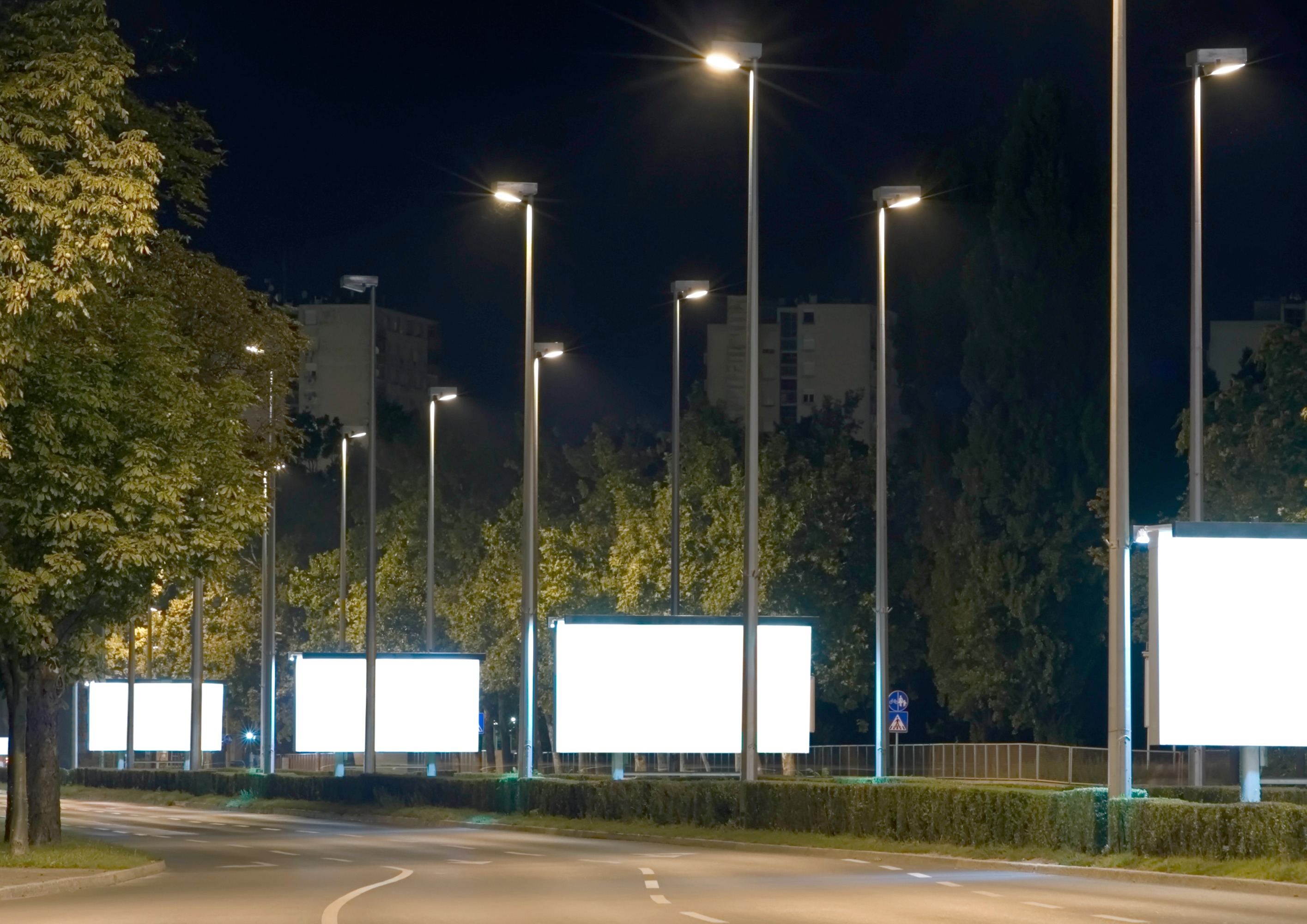 Empty billboards in the highway at night